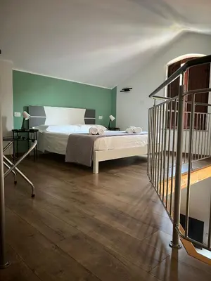 Letto o letti in una camera di Civico 116 Apartments