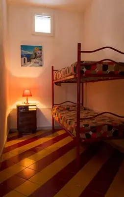 Letto o letti in una camera di A pochi passi dalla Spiaggia