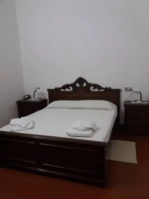 Letto o letti in una camera di A pochi passi dalla Spiaggia