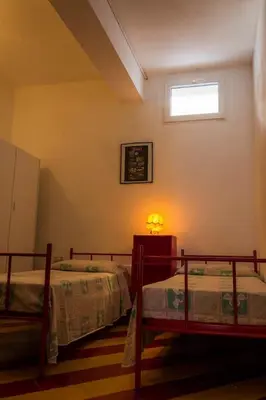Letto o letti in una camera di A pochi passi dalla Spiaggia