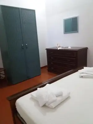 Letto o letti in una camera di A pochi passi dalla Spiaggia