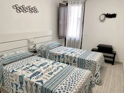 Letto o letti in una camera di Villasimius Vacation Home Casagorà