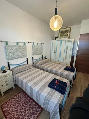 Letto o letti in una camera di Casa Anita 32