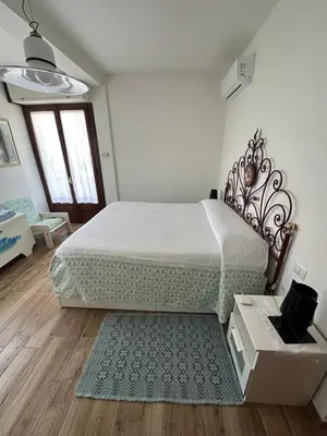 Letto o letti in una camera di Casa Anita 32