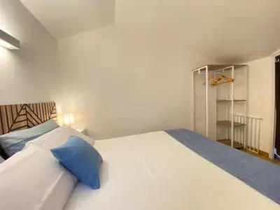 Letto o letti in una camera di Costa Rei Panoramic Terrace- Free Parking- BBQ-Netflix