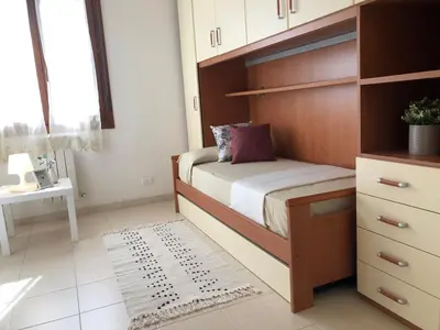 Letto o letti in una camera di Casa Vinny