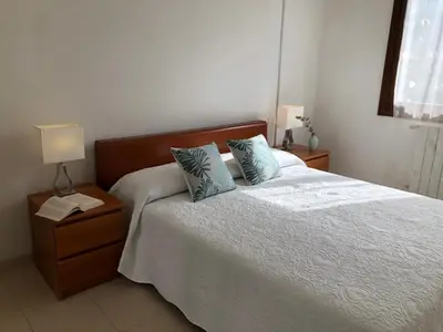 Letto o letti in una camera di Casa Vinny