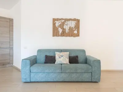 Area soggiorno di Apartment Via del Mare by Interhome
