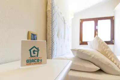 Letto o letti in una camera di Giaco's Apartments 2