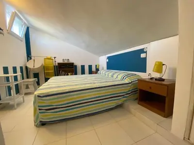Letto o letti in una camera di Casa vacanze Max