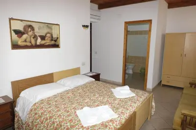 Letto o letti in una camera di La Vecchia Montagna B&B
