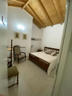 Letto o letti in una camera di Casa Sant'Antioco
