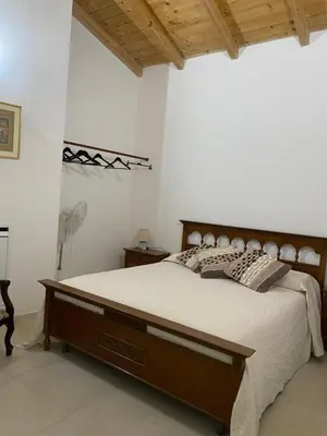 Letto o letti in una camera di Casa Sant'Antioco