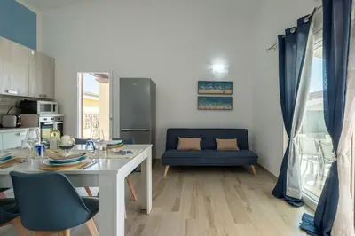 Cucina o angolo cottura di Villa Daniela- Costa Rei a 5 minuti a piedi dalla spiaggia con AC, WiFi e Parcheggi Privati