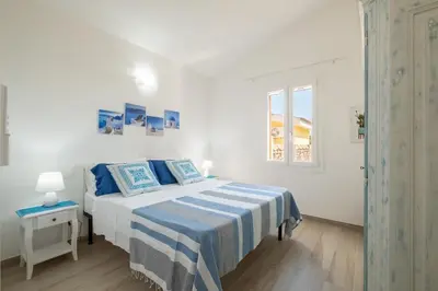 Letto o letti in una camera di Villa Daniela- Costa Rei a 5 minuti a piedi dalla spiaggia con AC, WiFi e Parcheggi Privati