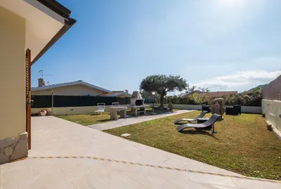 Giardino di Villa Daniela- Costa Rei a 5 minuti a piedi dalla spiaggia con AC, WiFi e Parcheggi Privati