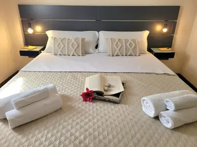 Letto o letti in una camera di Casa Martina