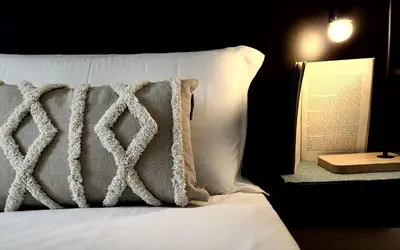 Letto o letti in una camera di Casa Martina