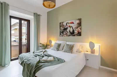 Letto o letti in una camera di Attico180 - Attico in centro con Terrazza - Wifi e Netflix