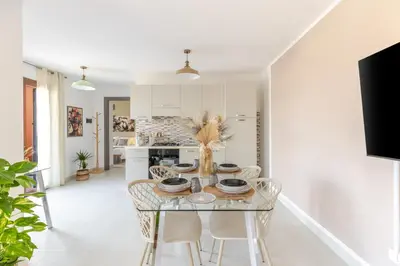 Cucina o angolo cottura di Attico180 - Attico in centro con Terrazza - Wifi e Netflix