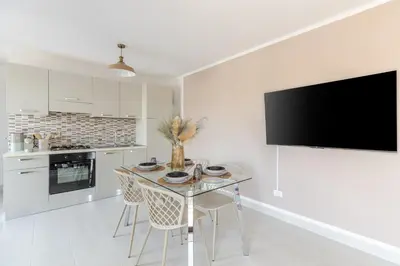Cucina o angolo cottura di Attico180 - Attico in centro con Terrazza - Wifi e Netflix