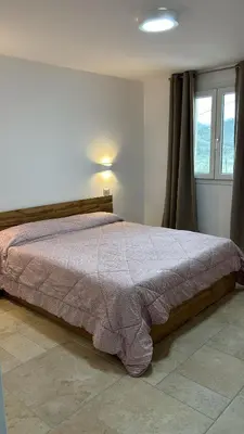 Letto o letti in una camera di Casa Settima Luna Relax e Natura con vista Mare