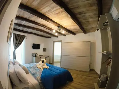Letto o letti in una camera di Biginau ' e giosso