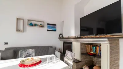 Area soggiorno di Mameli Apartment