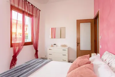Letto o letti in una camera di Casa Rubino - Garden and wifi in Pula