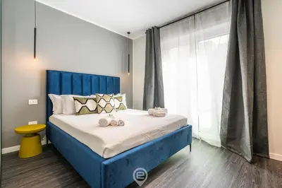 Letto o letti in una camera di Saint Margaret Apartments - Olivia