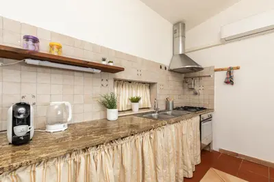 Cucina o angolo cottura di Casa Isolotto D'Ogliastra - vista mare