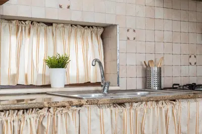 Cucina o angolo cottura di Casa Isolotto D'Ogliastra - vista mare