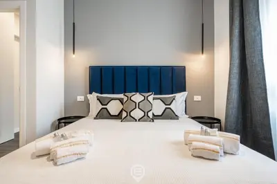 Letto o letti in una camera di Saint Margaret Apartments - Magnolia