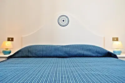 Letto o letti in una camera di Hotel Agugliastra