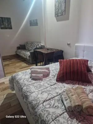 Letto o letti in una camera di Case Vacanza Marganai - Via Zagabria 36