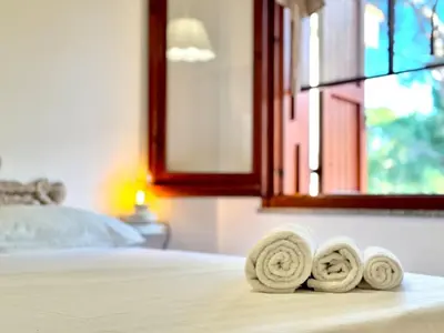 Letto o letti in una camera di Villa Dona', Santa Margherita di Pula