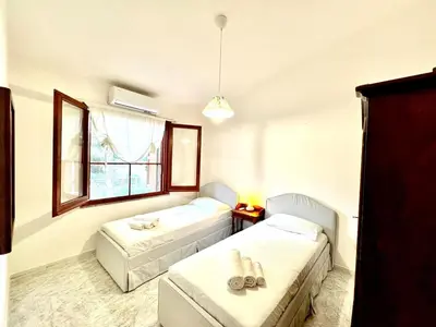 Letto o letti in una camera di Villa Dona', Santa Margherita di Pula