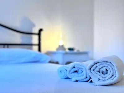Letto o letti in una camera di Villa Dona', Santa Margherita di Pula