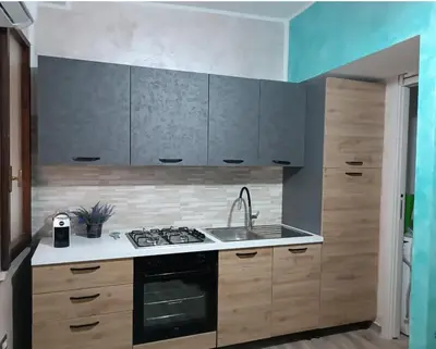 Cucina o angolo cottura di Pinus Village, Pula, sud Sardegna casa vacanze Vera's House