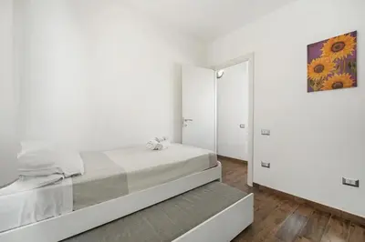 Letto o letti in una camera di Mare e Relax