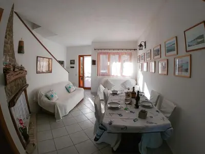 Area soggiorno di Andrea Frau - Casa Mandorleto new - Sardinia Villasimius-Peaceful Panoramic Terrace-full comfort air conditioning-WiFi-Parking-Privacy