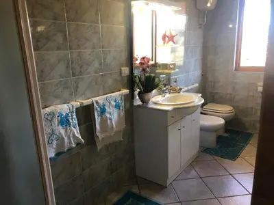 Bagno di Andrea Frau - Casa Mandorleto new - Sardinia Villasimius-Peaceful Panoramic Terrace-full comfort air conditioning-WiFi-Parking-Privacy