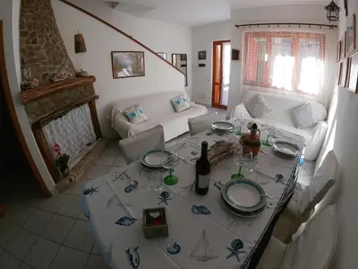 Area soggiorno di Andrea Frau - Casa Mandorleto new - Sardinia Villasimius-Peaceful Panoramic Terrace-full comfort air conditioning-WiFi-Parking-Privacy