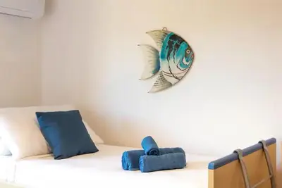 Letto o letti in una camera di Terrace sea view - Porto Columbu