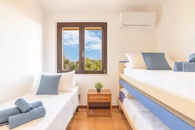 Letto o letti in una camera di Terrace sea view - Porto Columbu
