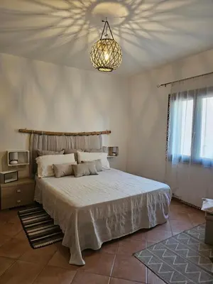 Letto o letti in una camera di Home Amsicora