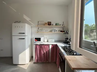Cucina o angolo cottura di Villa 6 Ospiti con Giardino vicino al Mare - Flumini, Quartu Sant'Elena, Cagliari