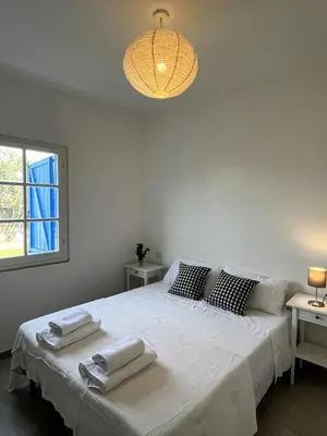 Letto o letti in una camera di Villa 6 Ospiti con Giardino vicino al Mare - Flumini, Quartu Sant'Elena, Cagliari