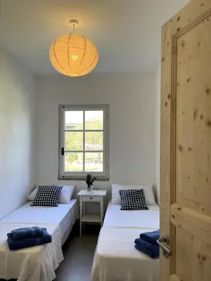 Letto o letti in una camera di Villa 6 Ospiti con Giardino vicino al Mare - Flumini, Quartu Sant'Elena, Cagliari