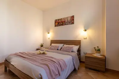 Letto o letti in una camera di Casa Lia